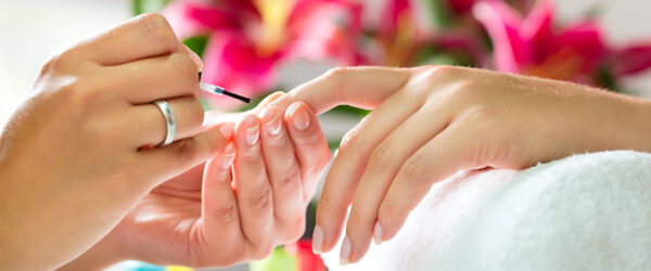 salon express services - a guest receiving a manicure at a salon
