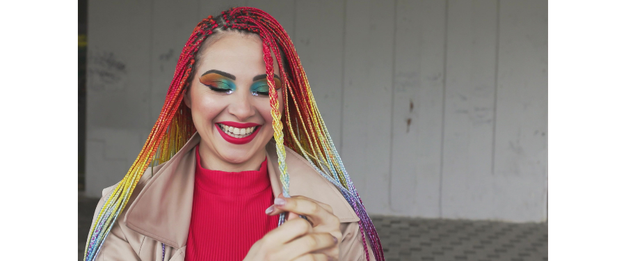 A woman with rainbow-colored pride hair